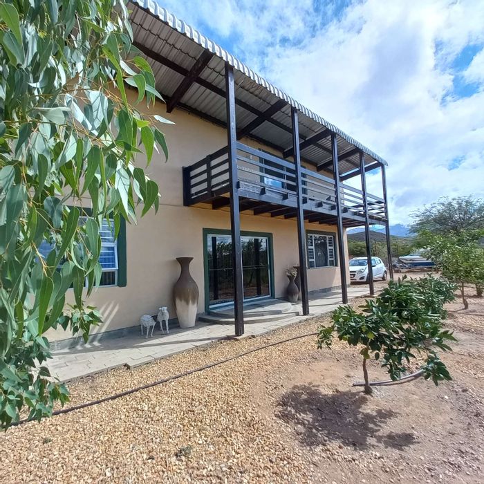 Farm for Sale in Calitzdorp Rural: Off-grid living, spacious home, ample water supply.