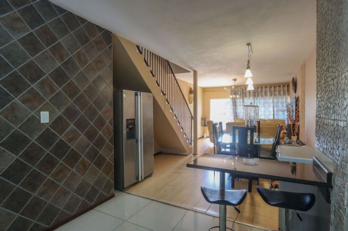 For Sale: 3-Bedroom Townhouse in Bluff with Lock-Up Garage and Private Courtyard.
