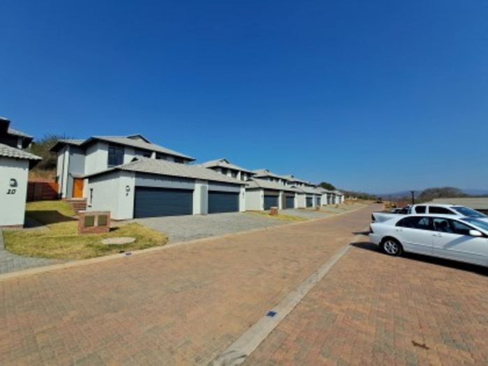 For Sale: Cluster in Bikki Wes with security, pool, and mountain views.