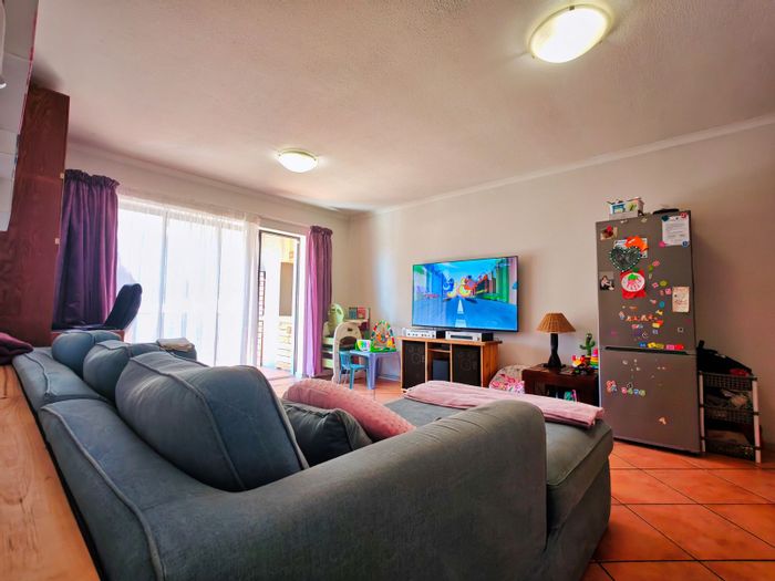 2-Bedroom Apartment For Sale in Hartenbos Central with inverter and braai patio.