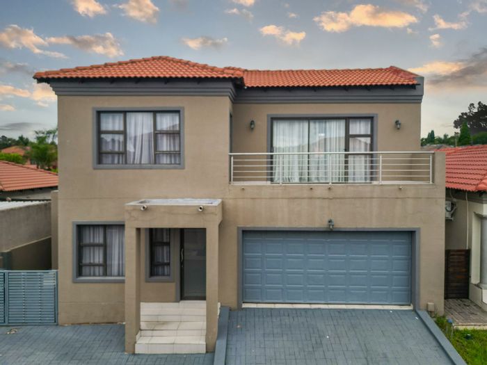 For Sale: House in Sagewood with 4 bedrooms, office, open-plan living, and balcony.