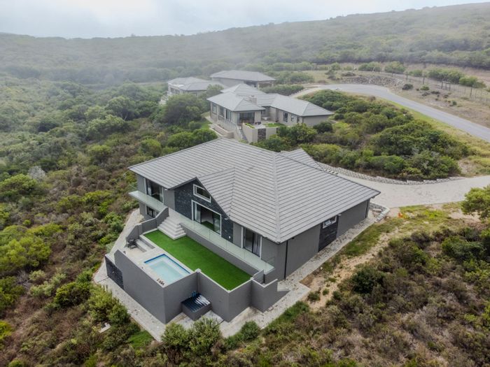 For Sale: House in Num Num Cape Estate with pool, spacious layout, and nature access.