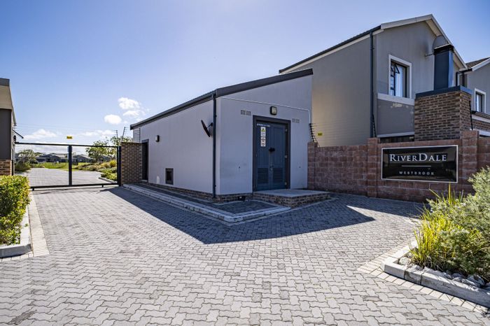 For Sale: Townhouse in Westbrook with 3 beds, double garage, and communal pool.