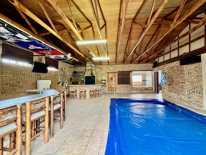 Secunda Central House For Sale: Entertainer's paradise with pool, flatlet, and ample parking.