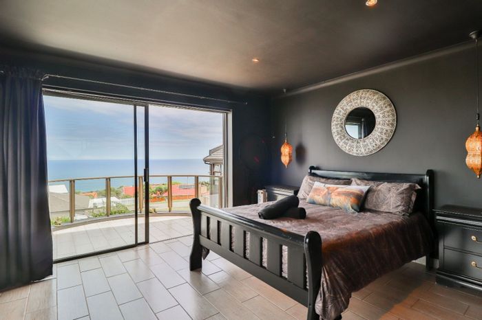 For Sale: House in Dana Bay with ocean views, multiple flats, and ample parking.