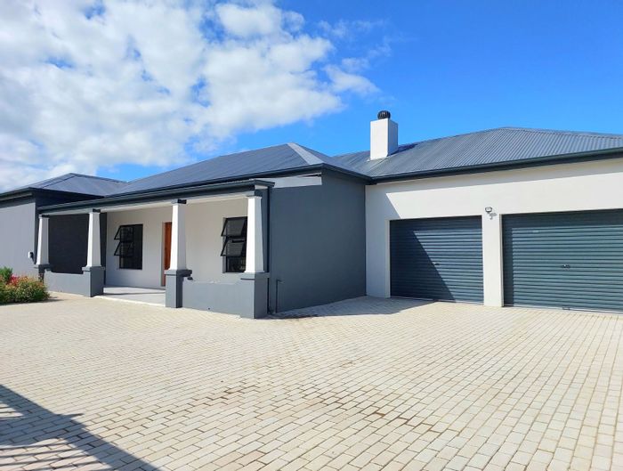 For Sale: House in George South with spacious layout, indoor braai, and secure garden.