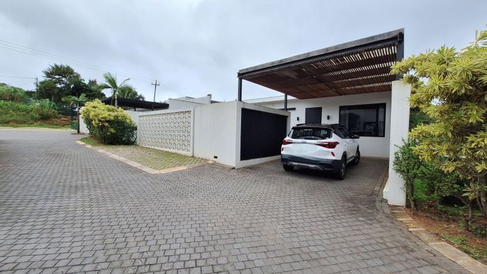 Townhouse To Rent in Elaleni Coastal Forest Estate with pet-friendly garden and air conditioning.