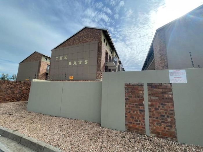 For Sale: Apartment in Dassie Rand with secure living, balcony, and parking.