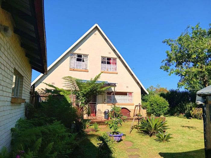Graskop Central House For Sale: Spacious 3-bed home with garden, chicken coop, and security.