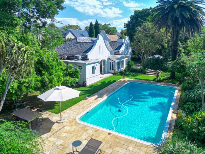 Bryanston House For Sale: Three residences, pool, gardens, and extensive parking.