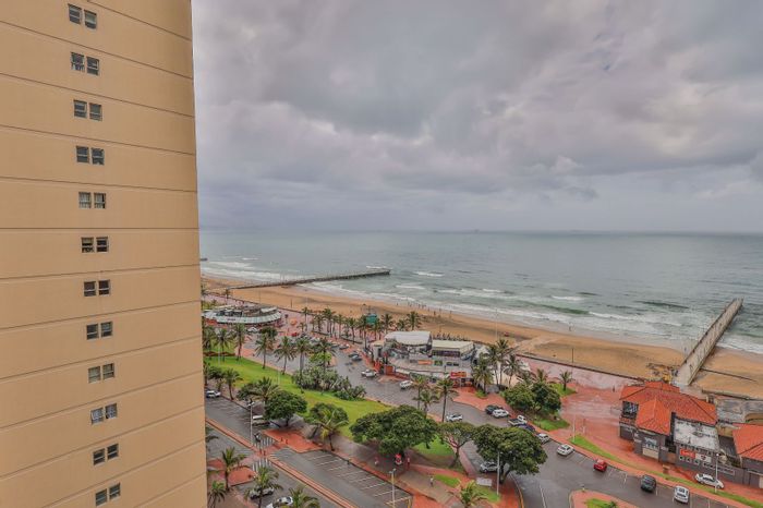 North Beach Apartment For Sale: 2 Bedrooms, Ocean Views, Beachfront Access.