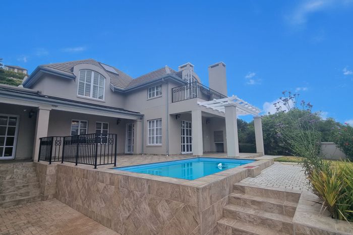 Spacious 5-bedroom house with pool, garages, and self-catering apartments in The Village.