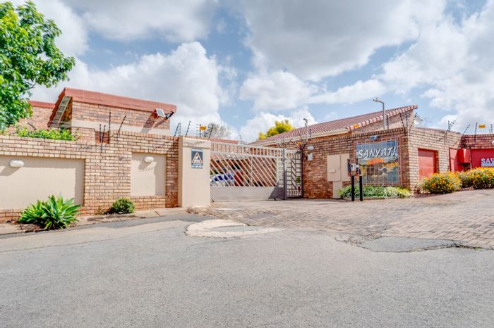 3-Bedroom Townhouse in Weltevreden Park with Garden, Double Garage, and Backup Power. For Sale.