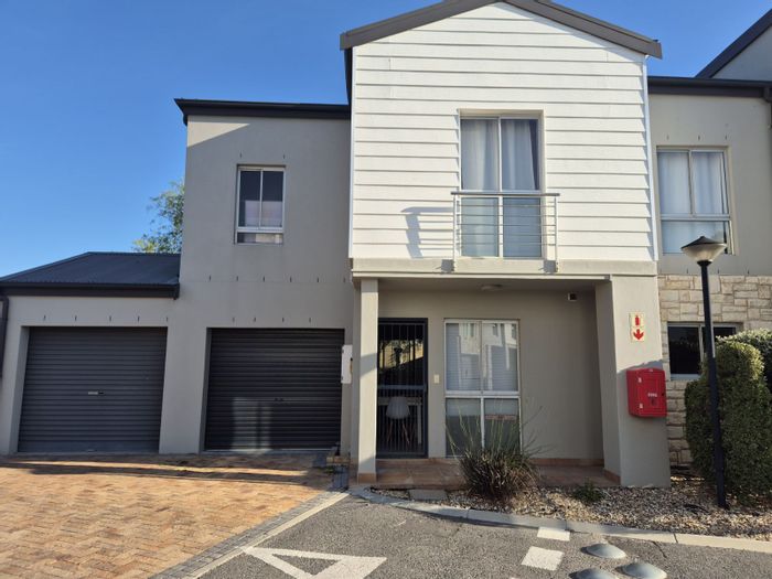 For Sale: House in Strand South with 3 bedrooms, 2 garages, and secure complex.