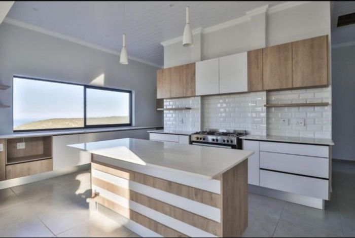 For Sale: House in Island View with ocean views, gourmet kitchen, and double garage.