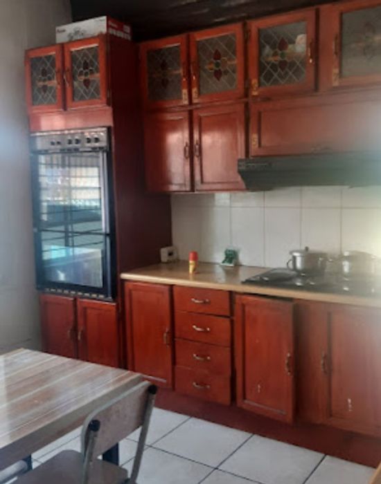 For Sale: Spacious Brixton House with 6 bedrooms, cottage, and ample parking.