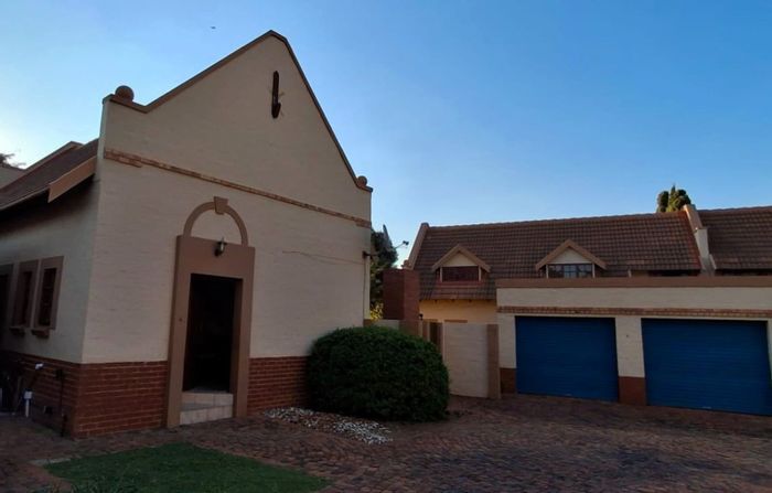 For Sale: Equestria Townhouse with private garden, double garage, and flexible living spaces.