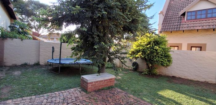 Townhouse For Sale in Equestria: 3 beds, private garden, double garage, secure complex.