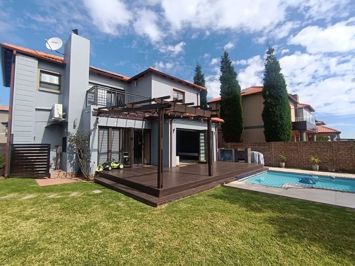 For Sale: House in Parkrand with pool, garden, and secure estate amenities.