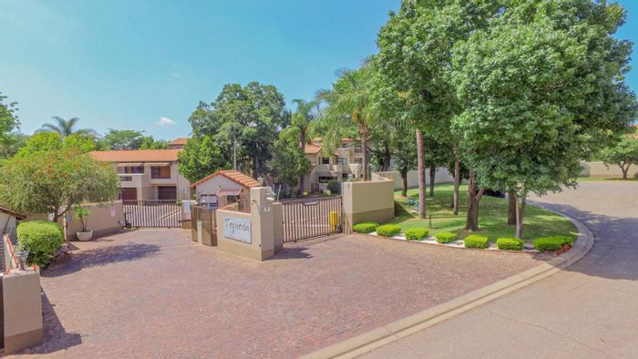 Paulshof Apartment For Sale: Private patio, communal pool, 24-hour security, parking included.