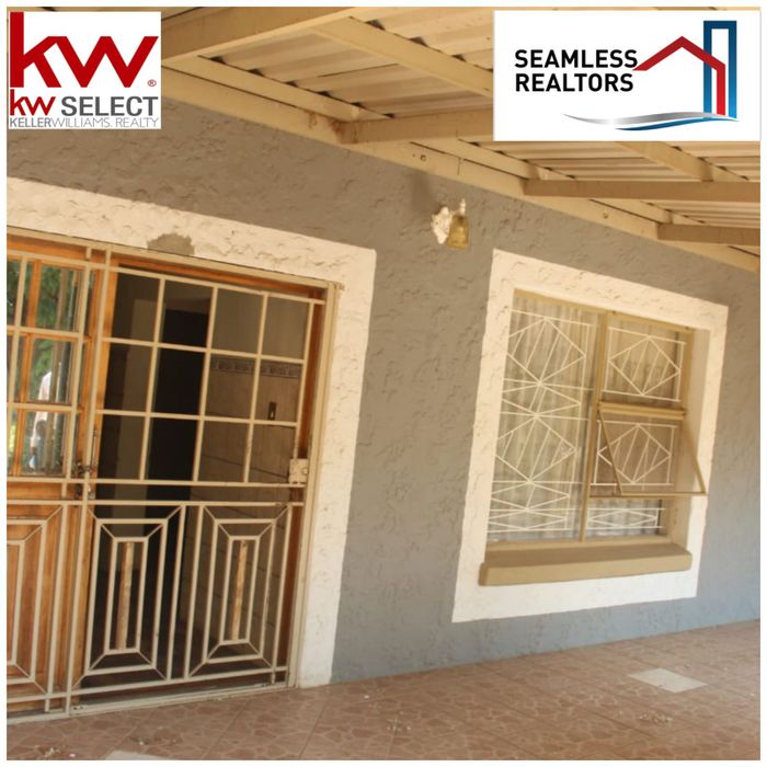For Sale: House in Christiana Central with garden, double garage, and borehole.