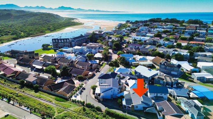 For Sale: Hartenbos Central House with 3 bedrooms, braai area, and carport.