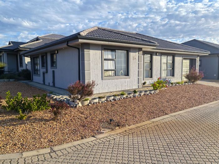 For Sale: House in Dana Bay with 3 bedrooms, garage, and eco estate amenities.