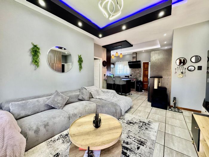 For Sale: 3-Bedroom Townhouse in Terra Nova with garage, courtyard, and modern kitchen.