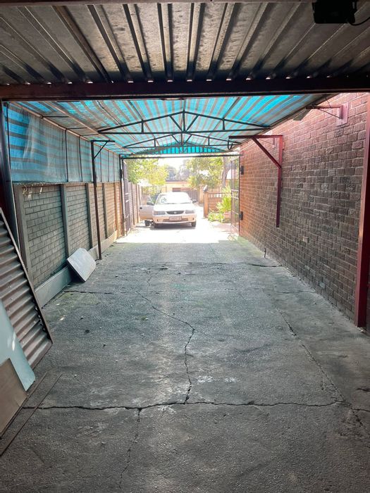 4-Bedroom House in Pretoria West For Sale with Garage and Ample Parking Spaces.