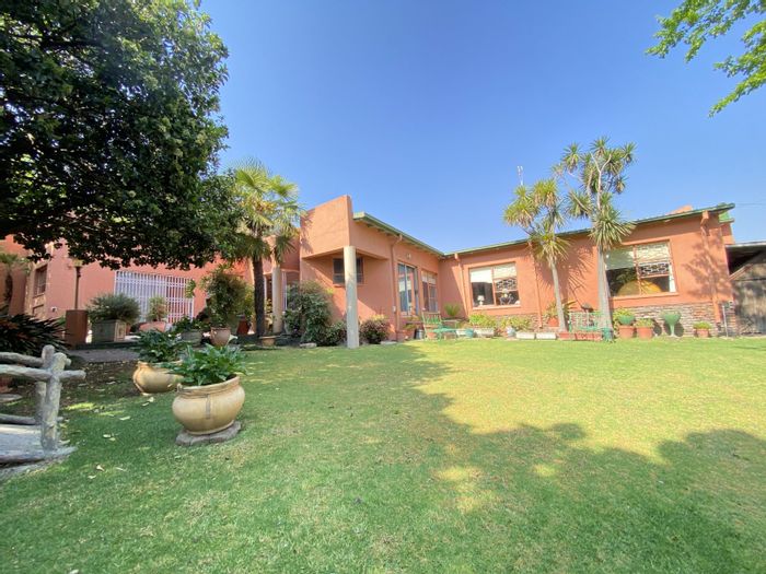 Spacious 4-bedroom house in Trichardt with flatlet, garages, and eco-friendly features. For Sale.