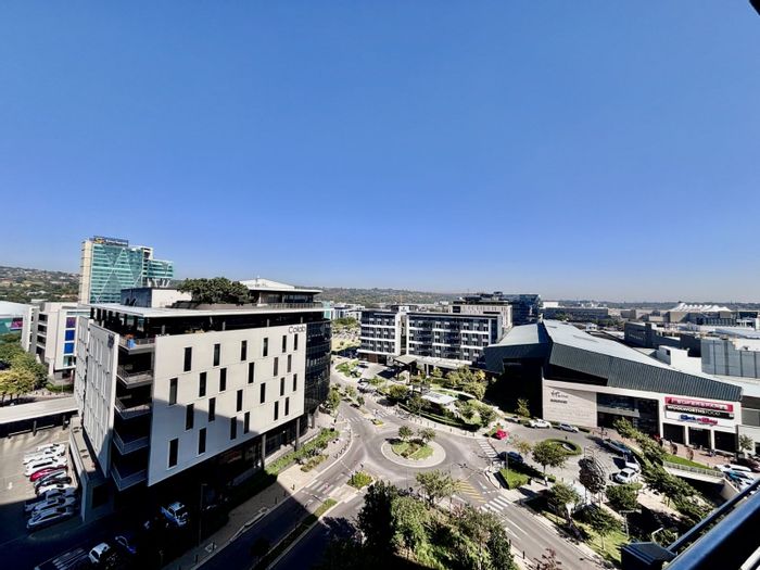 For Sale: Menlyn Apartment with Casino Views, Rooftop Pool, and 24/7 Security.