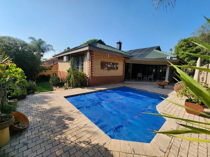 For Sale: House in Moreleta Park with pool, security, and staff quarters.