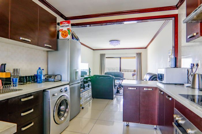 Secure 2-bedroom apartment in Summerset with clubhouse, pool, and gym access. For Sale.