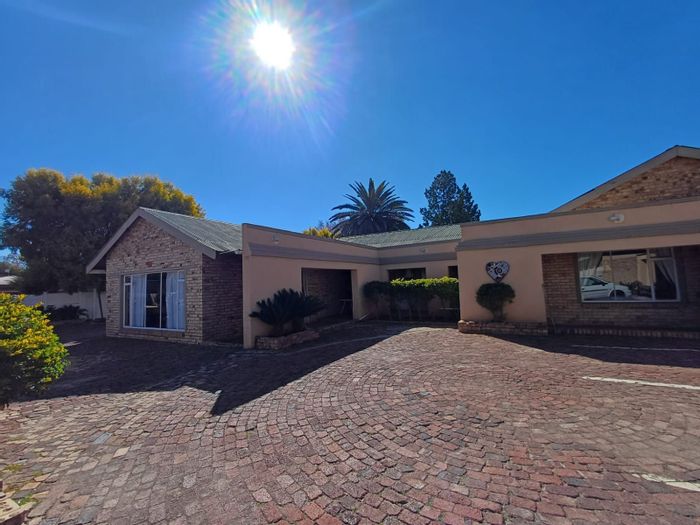 For Sale: Guest House in Wilkoppies with 19 rooms, pool, and security features.