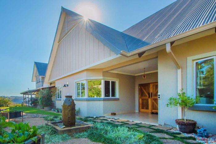 For Sale: House in Chancliff AH with pool, theater, flatlet, and workshop.