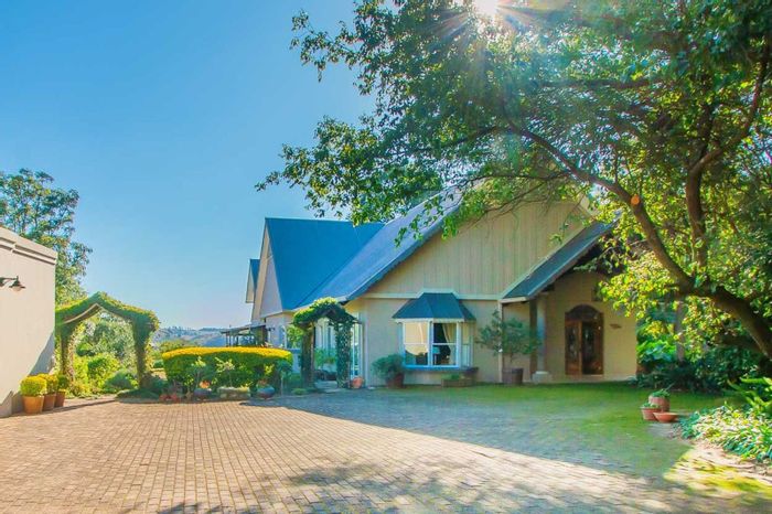 For Sale: House in Chancliff AH with pool, theater, flatlet, and expansive gardens.