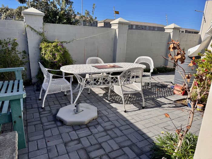 For Sale: House in Muizenberg Central with garden, secure estate, and beach access.