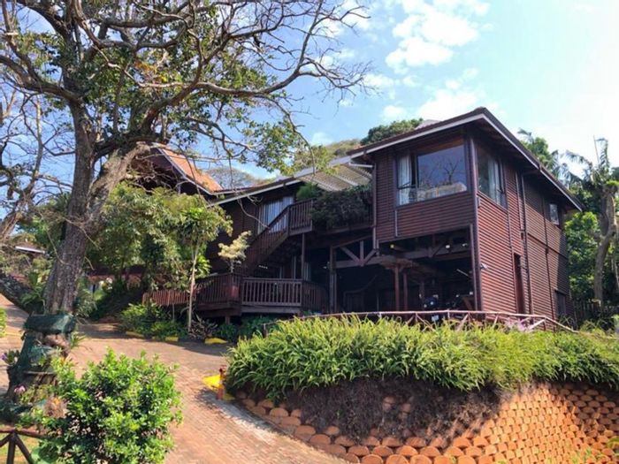 For Sale: Southport Townhouse with Flatlet, Garages, Off-Grid Features & Pool Access.