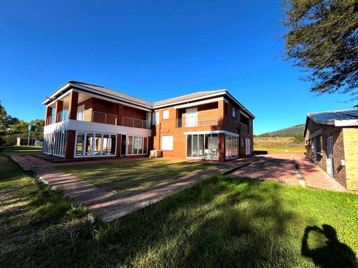 For Sale: Parys Central Farm with Vaal River frontage, game fencing, and multiple dwellings.