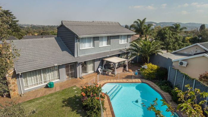Dowerglen House For Sale: Spacious 6-bedroom home with pool, security, and versatile rooms.