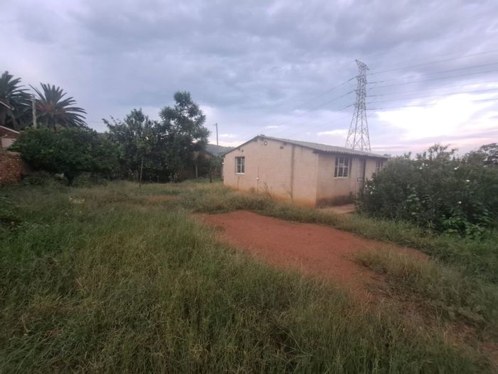 For Sale: House in Mamelodi West with large yard, corner plot, and easy access.