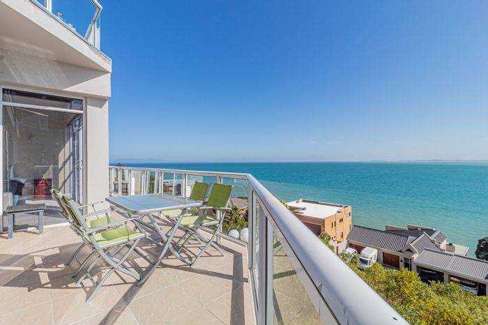 3-Bedroom Apartment To Rent in Mountainside with balcony, garage, and ocean views.