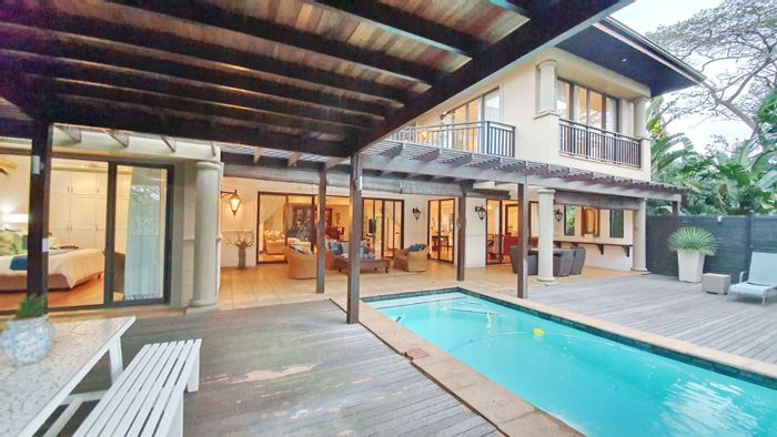 Zimbali House For Sale: Fairway views, wine cellar, games room, and pool.