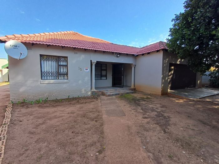 3 Bedroom House For Sale in Stilfontein Central with garage, carport, and alarm system.