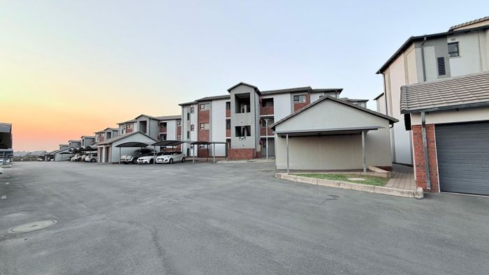 Amberfield Apartment For Sale: 2-bed, pool access, play area, private balcony.