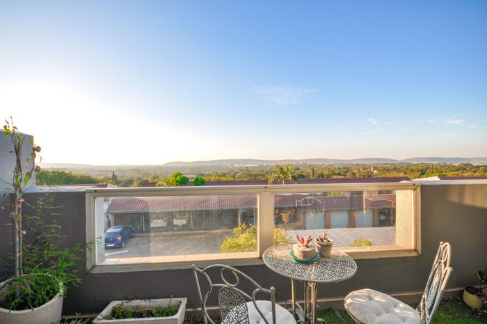 La Montagne Apartment For Sale: 2 beds, backup electricity, scenic views, spacious living.