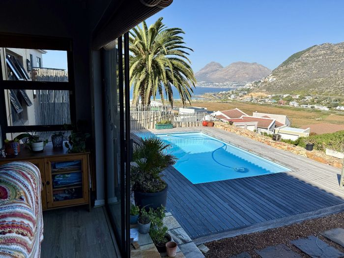 House For Sale in Glencairn Heights: Pool, wine cellar, spacious living, sea views.