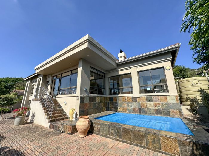 For Sale: House in Matumi Golf Estate with 3 beds, entertainment room, and water tanks.