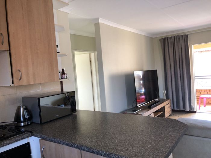 For Sale: Apartment in Karenpark with pool, kiosk, and secure parking.
