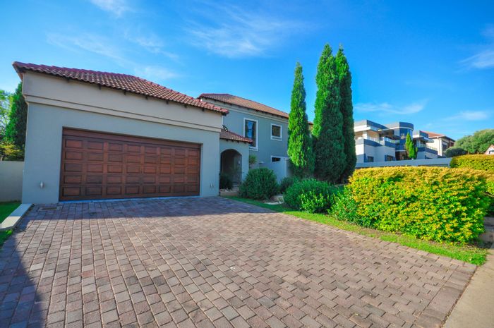 House For Sale in The Wilds: Entertainment areas, heated pool, garage, and Boma.